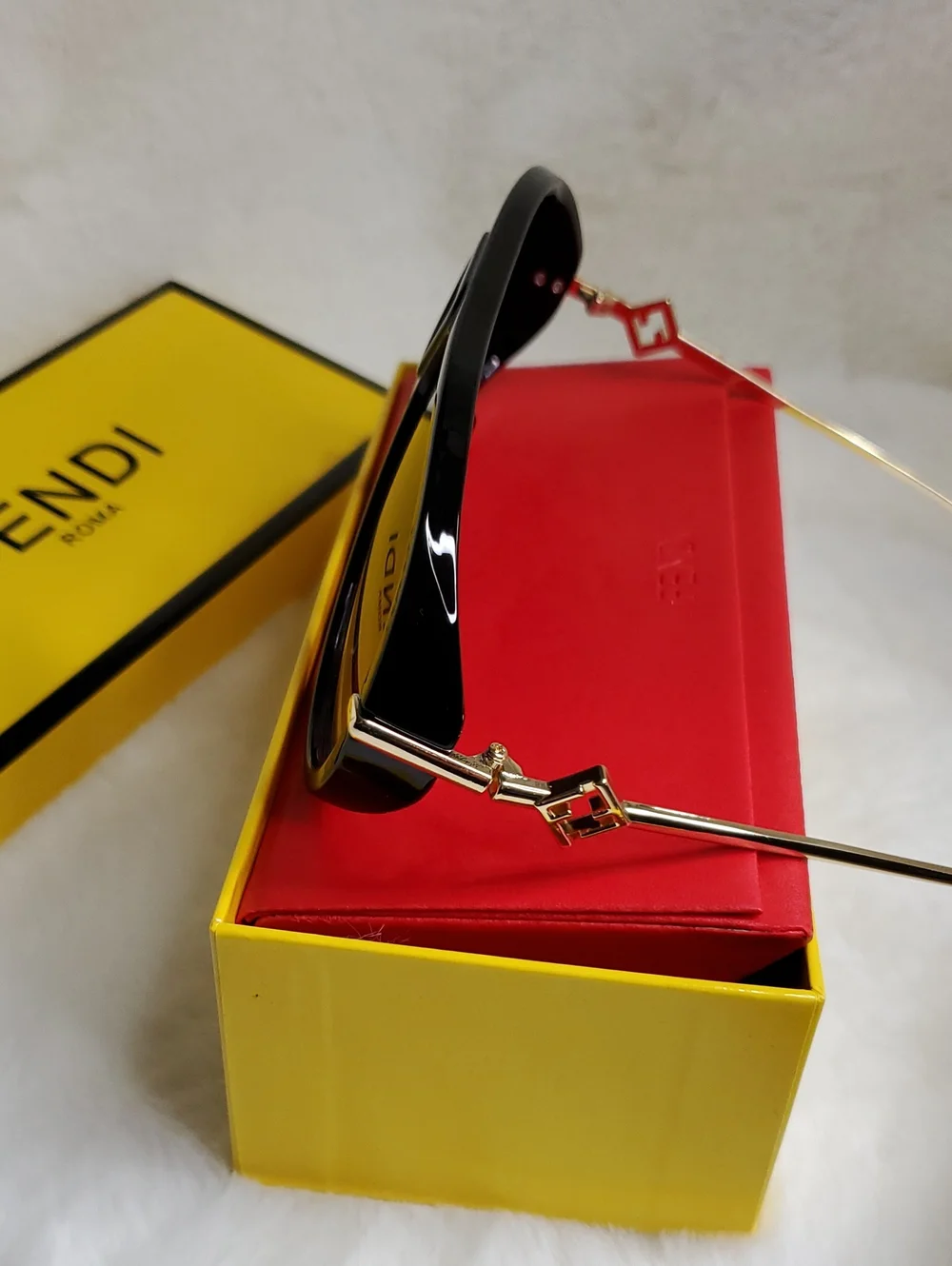 F Black and Gold Rimless Sunglasses